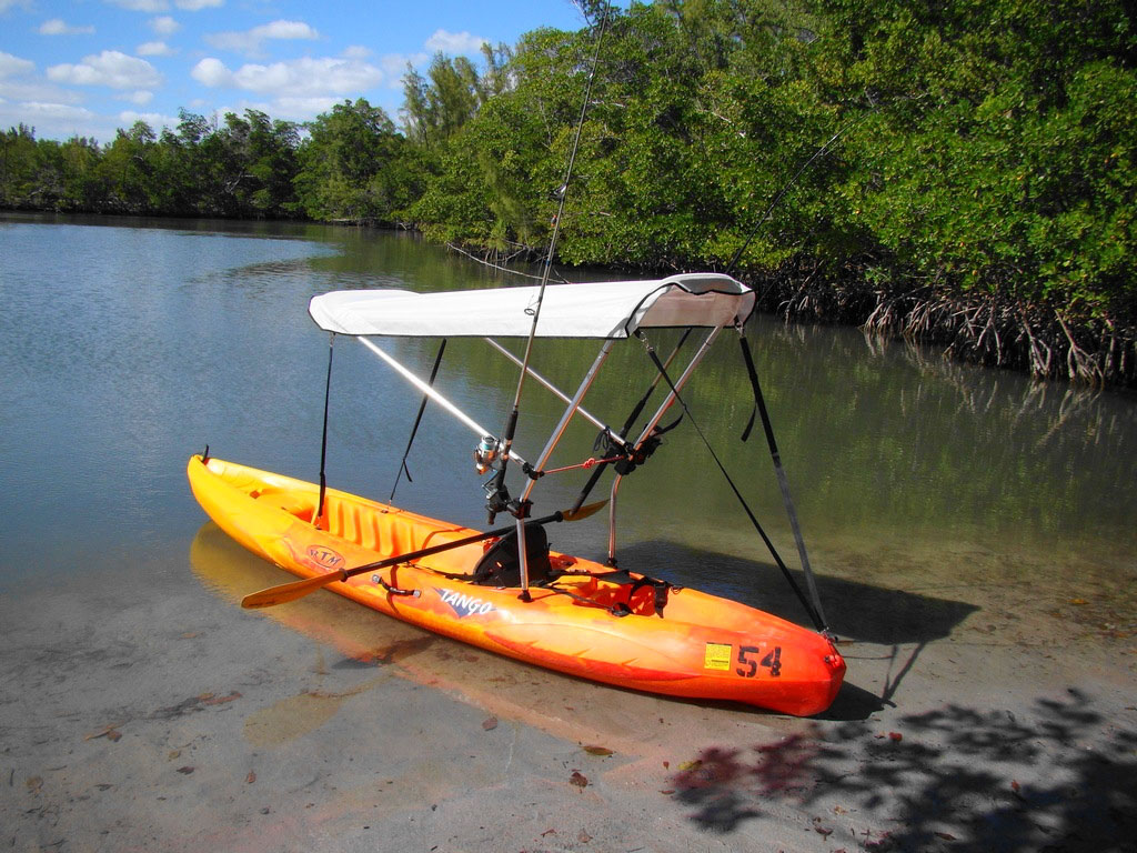 Bimini top for sit on top kayak with fishing rod holders attached to 