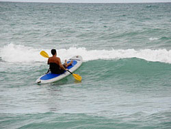 Surfing waves with Saturn SOT330 sit on top inflatable surf kayak. Click to zoom in.