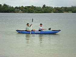 2 adults can paddle easy inside Saturn inflatable kayak.