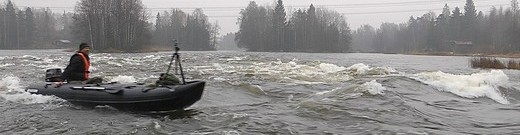 Saturn SK487 KaBoat in whitewater action.