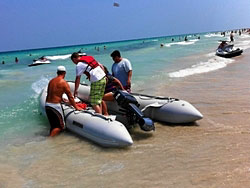 Saturn boats working hard at South Beach for rental operations.