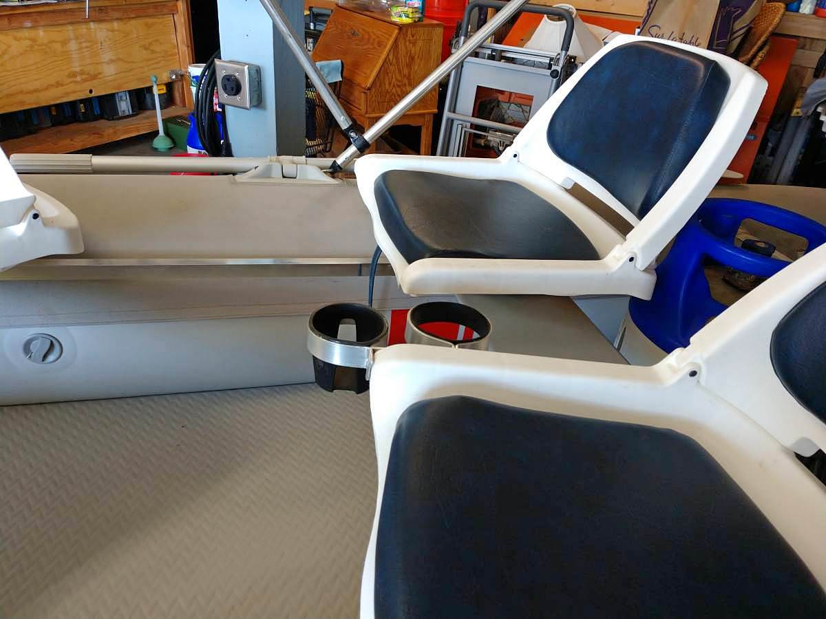Installing fishing chair on inflatable boat