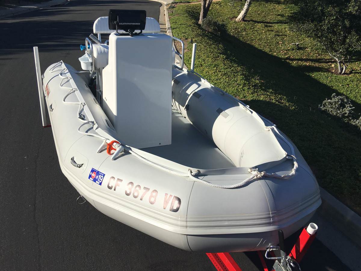 Fiberglass central console was mounted on aluminum floor for this Saturn inflatable boat