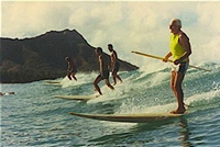 Paddle board surfing in Hawaii.