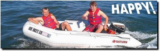 Two boys riding in Saturn 11' inflatable boat and having great time.