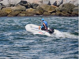 Saturn Inflatable Boat SD330 in an ocean