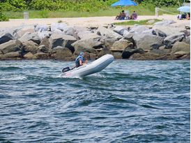 Saturn Inflatable Boat SD330 in an ocean