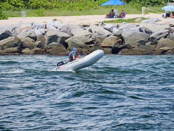 Saturn Inflatable Boat SD330 in an ocean