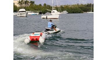 Towable inflatable boat for cargo transportation