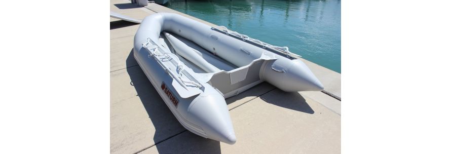 Inflatable boat in marina without floor
